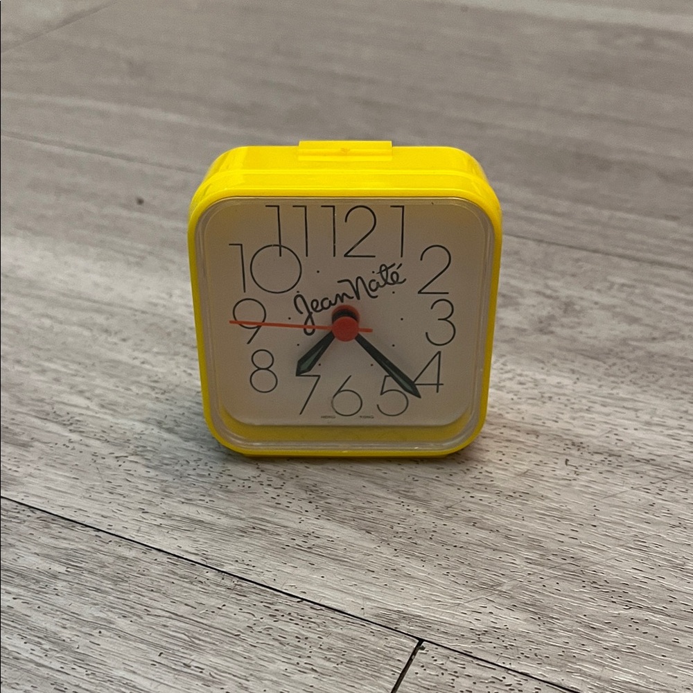 Small, Yellow Vintage 1980s Jean Nate Alarm Clock